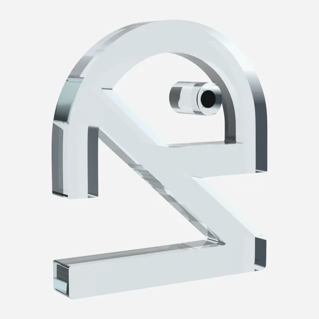Un des premiers essais 3D : le logo en plaque de verre clair aux arêtes vives.